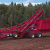 Root and stump picker in a peat moss field 