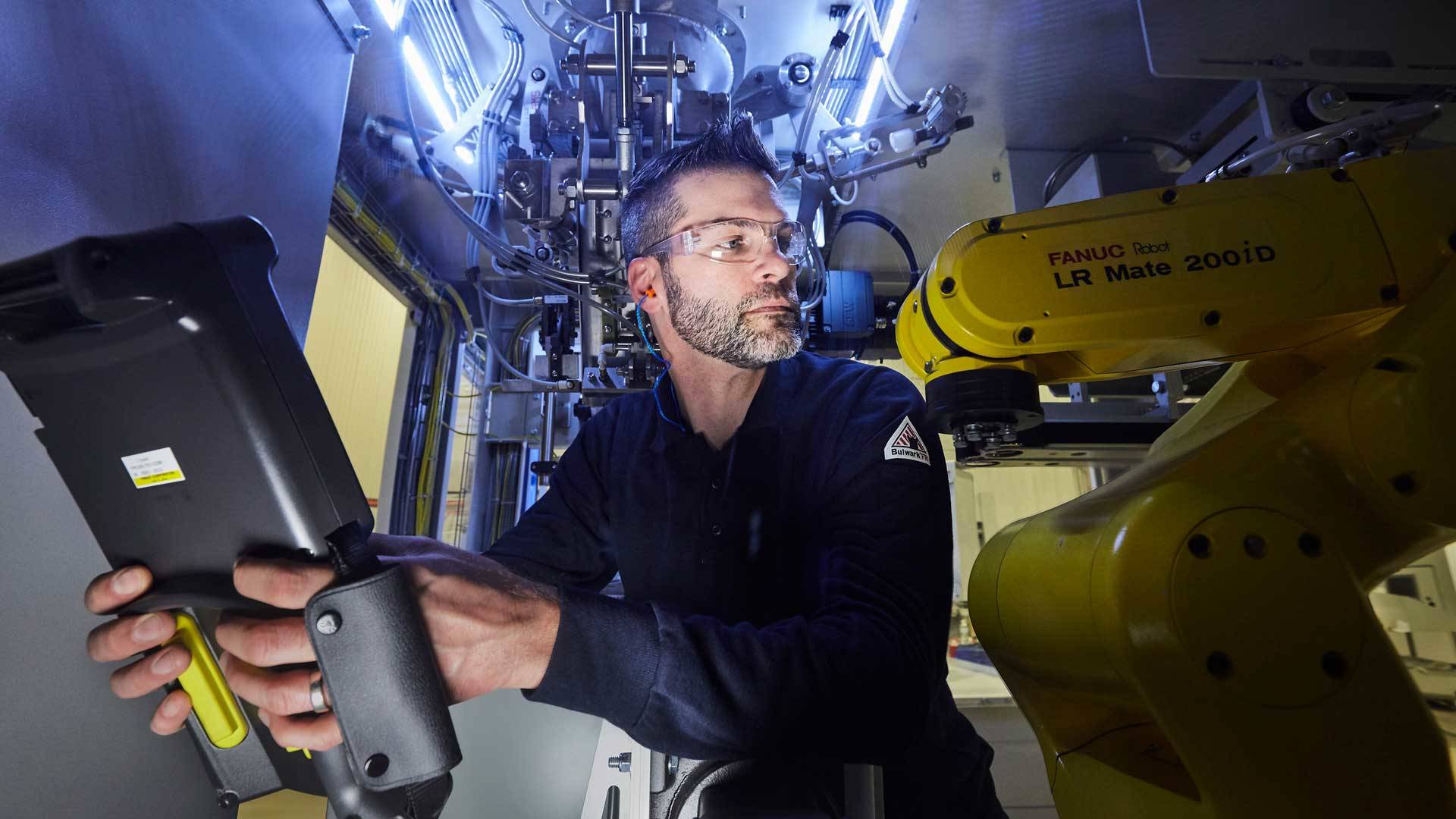 Service technician configuring an equipment for installation