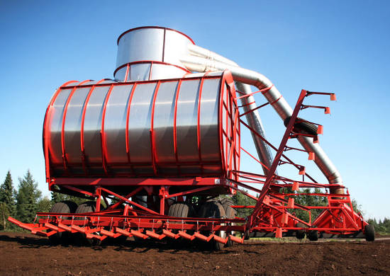 Two-head vacuum peat harvester